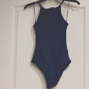 A large Ambiance brand bodysuit.